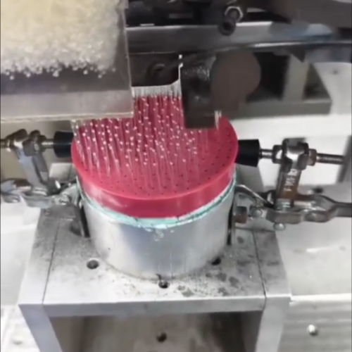 production of hair brush